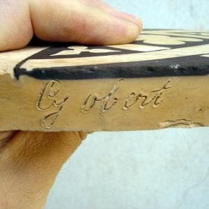 Side signed tile